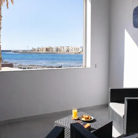 En Primera Linea De La Playa Апартаменты Аринага